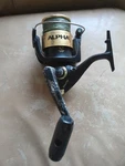 Shakespeare Alpha 2560WM Spinning Reel. Fixed Price $8.00.