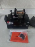 Abu Garcia Ambassadeur 7000 Cs Round Baitcast Reel. Right Hand. Black Gold. Fixed Price $189.99.