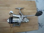 Pflueger Supreme Spinning Fishing Reel Made Korea & Braid Line (LOT#16904). Fixed Price $75.00.