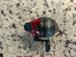 Zebco Dock Demon Spincast Reel Red Black -tested. Fixed Price $5.99.