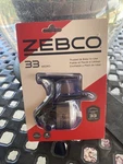 Zebco Micro Spincast Fishing Reel 4LB Spooled Metal Gears (33MTN)/ New Sealed. Fixed Price $15.00.