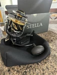 Shimano Stella Sw 20000PG Spinning Reel 4.4:1 Black/gold W/ Box & Case. Fixed Price $950.00.