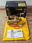 Penn International 70VS Two Speed Lever Drag Conventional Reel W/ Box #1. Fixed Price $629.99.