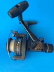 Shimano FX300 Trigger Fire Spinning Reel Fishing Rear Drag Graphite. Fixed Price $18.69.