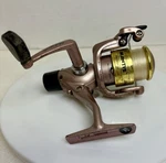 Shakespeare Mantis Fishing Reel MN030RT. Rose Colored.. Fixed Price $11.95.