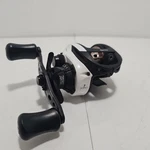 Quantum Accurist Baitcasting Reel AC100SPT R/h White Black Flippin Switch. Fixed Price $49.00.
