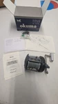 Okuma T15L Titus Fishing 175 Degree Lever Drag System Pre-owned Right Hand. Fixed Price $95.00.