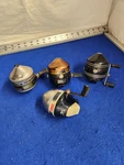 Lot 4 Vintage Zebco Fishing Reels, Not Working, For Repair/parts. Fixed Price $25.00.